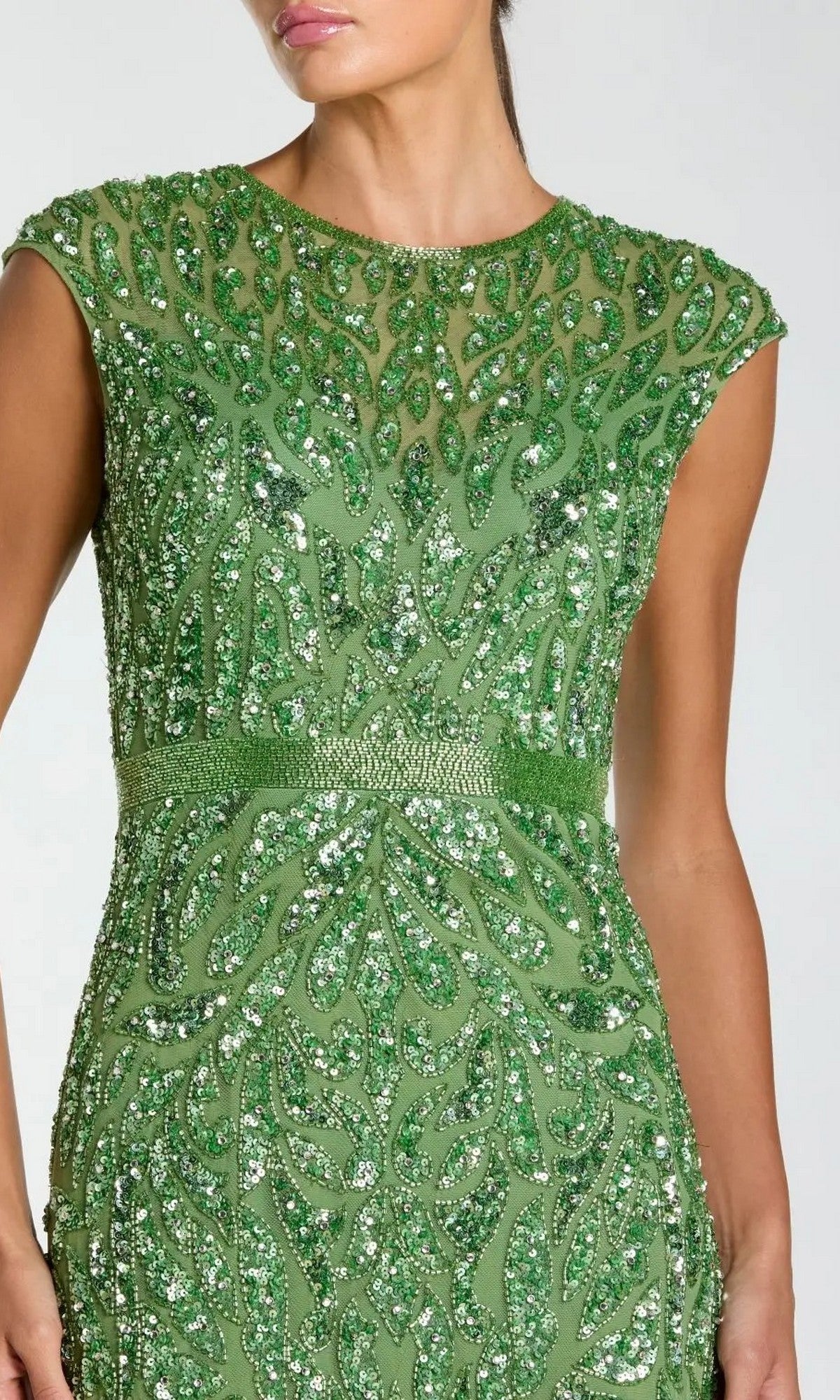 Woman wearing the Silver Long Sequin Formal Dress by Mac Duggal 5532—an elegant fitted gown adorned with shimmering sequins, perfect for a sophisticated mother of the bride look.